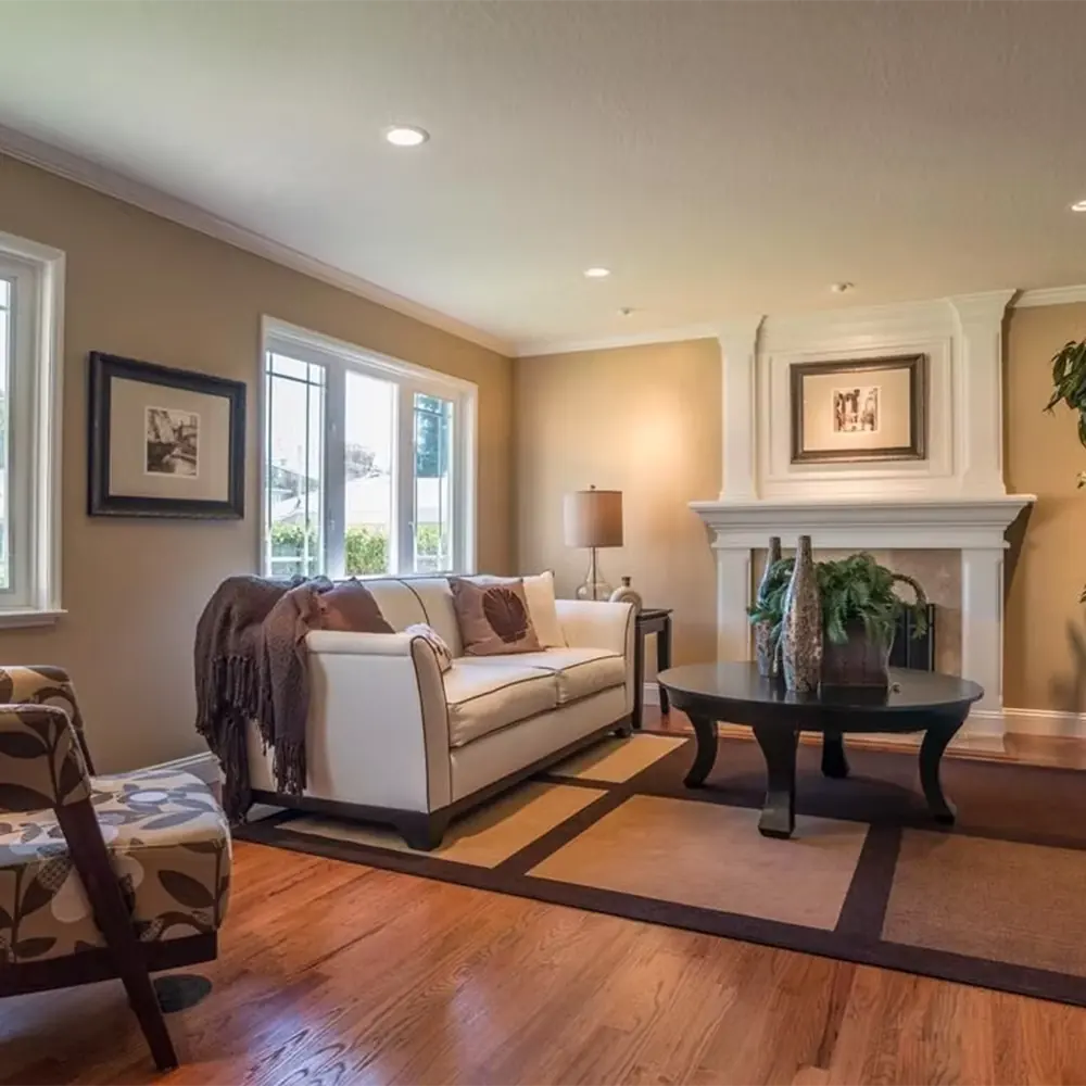 Living room finished with crown molding and trim